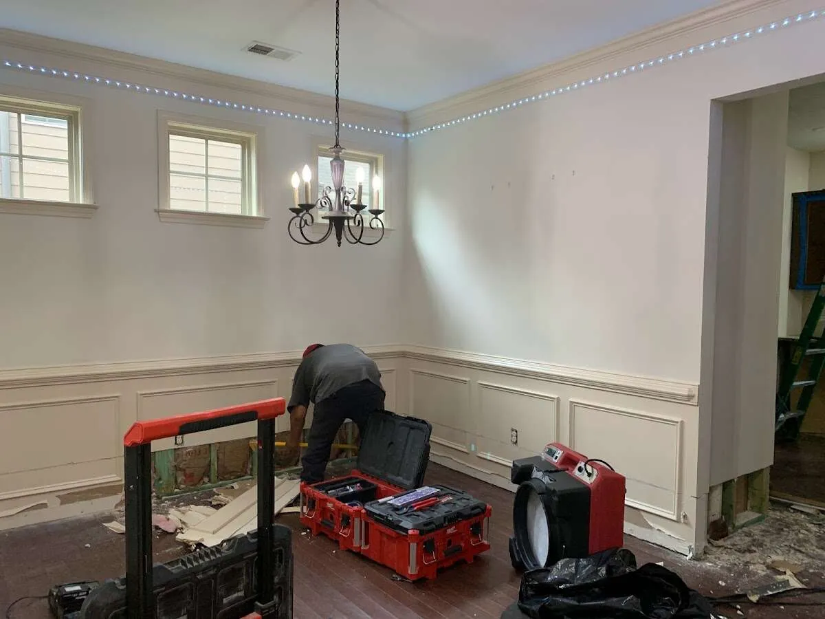 Restoration technician with professional equipment in Point Pleasant